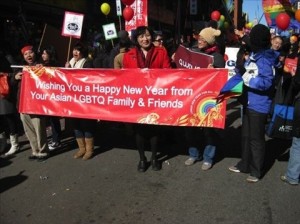 Pauline Park with LGBT banner